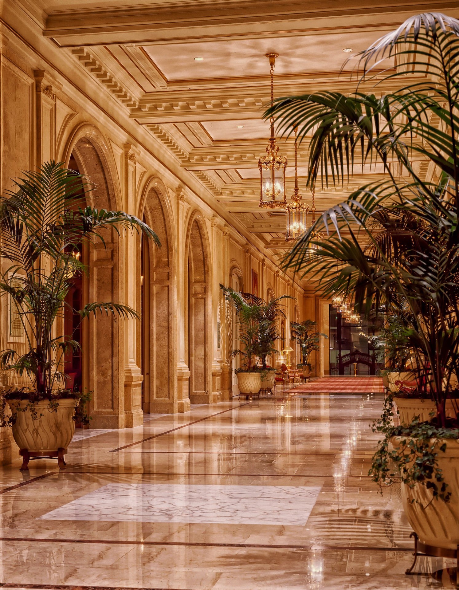 Warm luxury hotel interior at CorvelliangrandStay